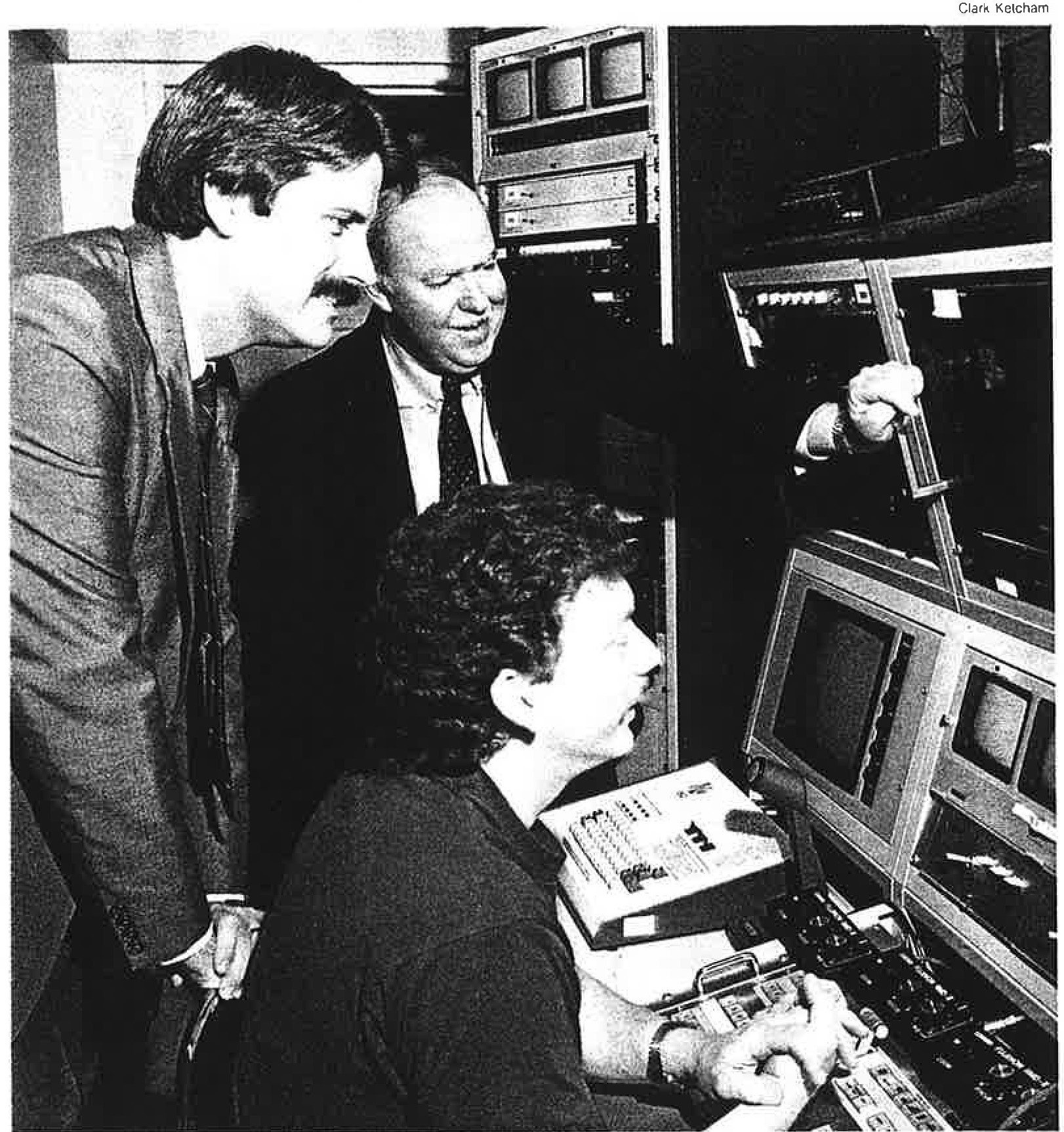 Connick, Hurst, and a technician in the ITV control room, newspaper clipping.