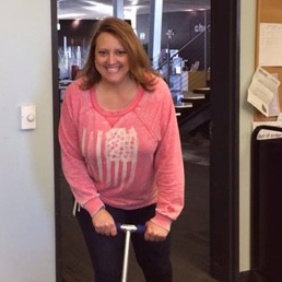 Casey on her scooter at the library.