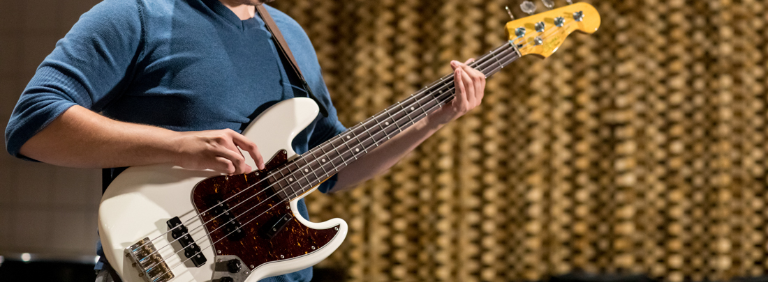 UA student playing guitar