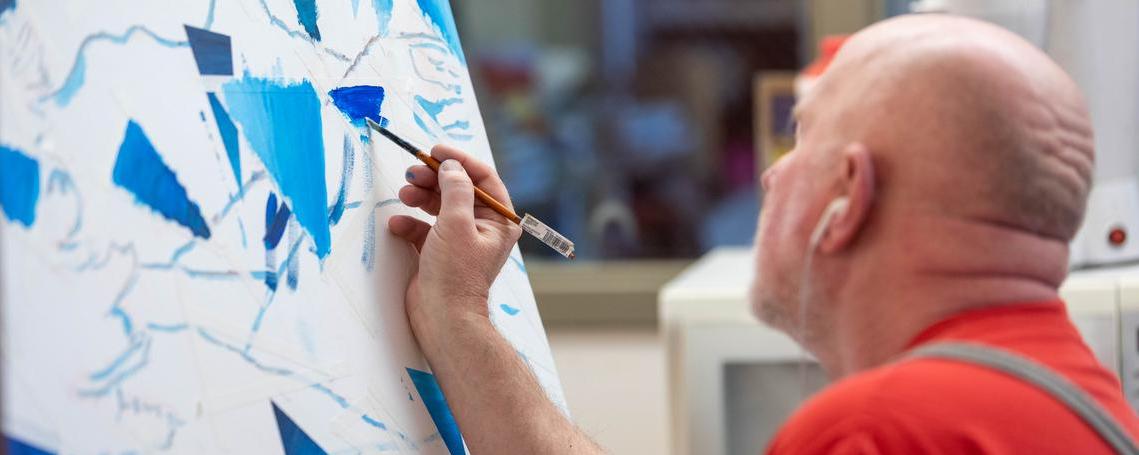 UMA student creating art