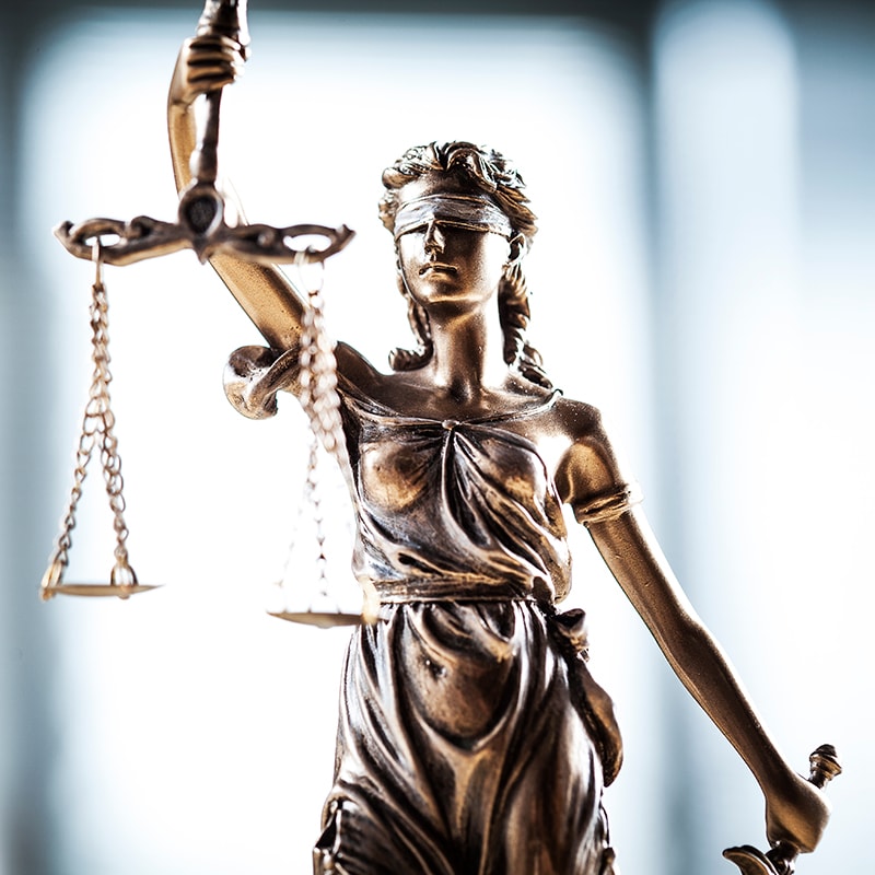 statue of justice holding scales