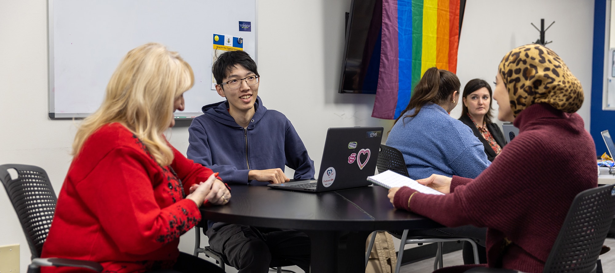 uma students working with tutoring department