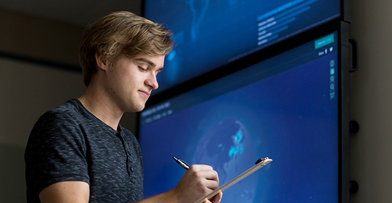 Student Taking Notes