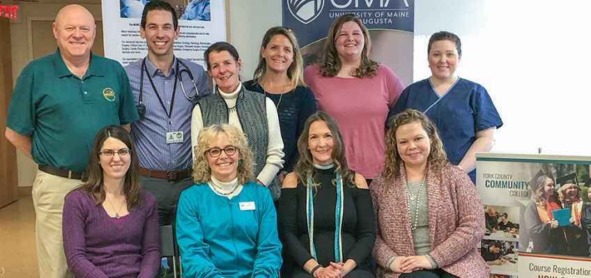 From left to right standing: Niel Nielsen, Dr. Ezra Steinberg, Brenda McAleer, Jocelyn Potthoff, Allison Simpson, Angi Parker. From left to right seated: Jennifer Freese, Margaret Wheeler, Catherine Osterhaudt, Lisa Quinones.