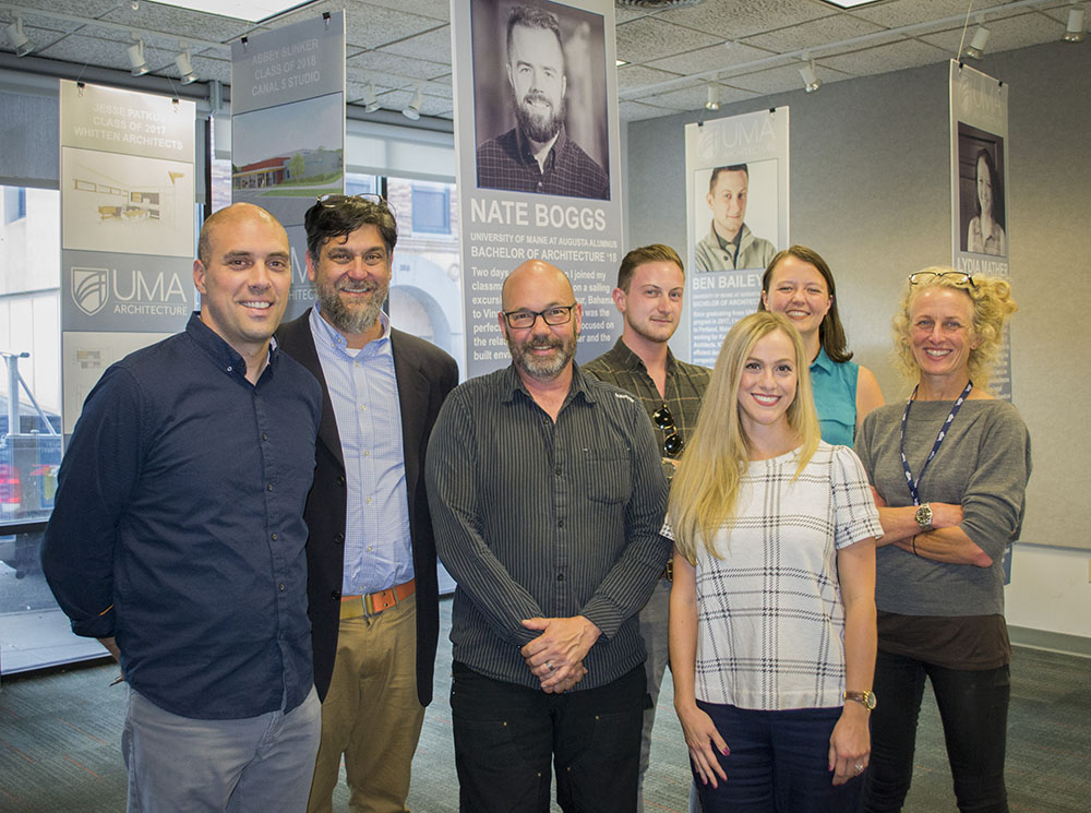 A group photo from the Alumni Exhibit reception event. 