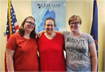 A family photo of three generations of the Meserve family attending college at the UMA Saco Center