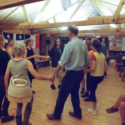 Participants dancing to live music at the French Immersion weekend.