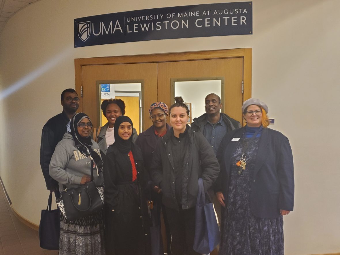 L/A College Transitions students visit UMA's Lewiston Center, pictured here with UMA's Lynn Poor (far right).