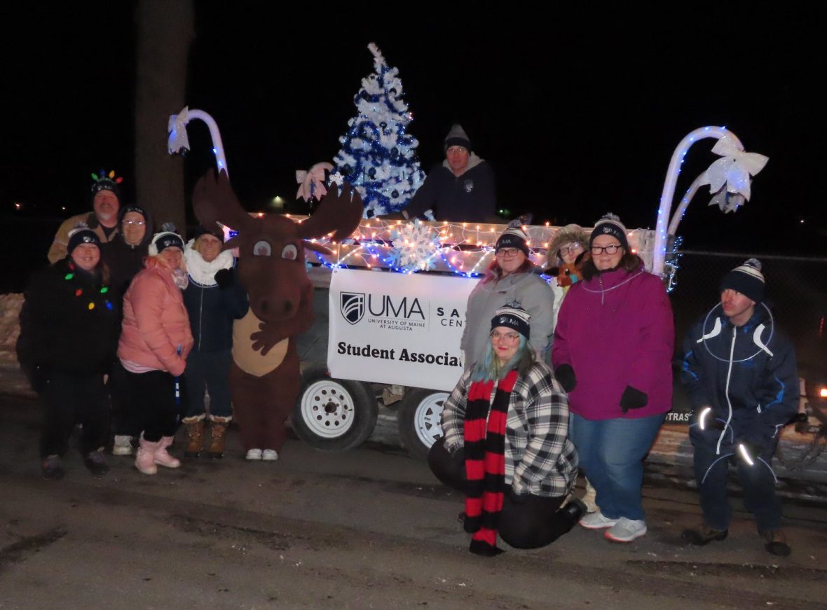 UMA Staff and Student members participating in the Festival of Lights Parade in Saco 2019