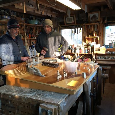 Robert Katz and Dan Mitchell in the workshop.