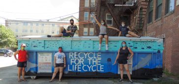 Group Photo - UMA AIAS and the newly decorated recycling bin