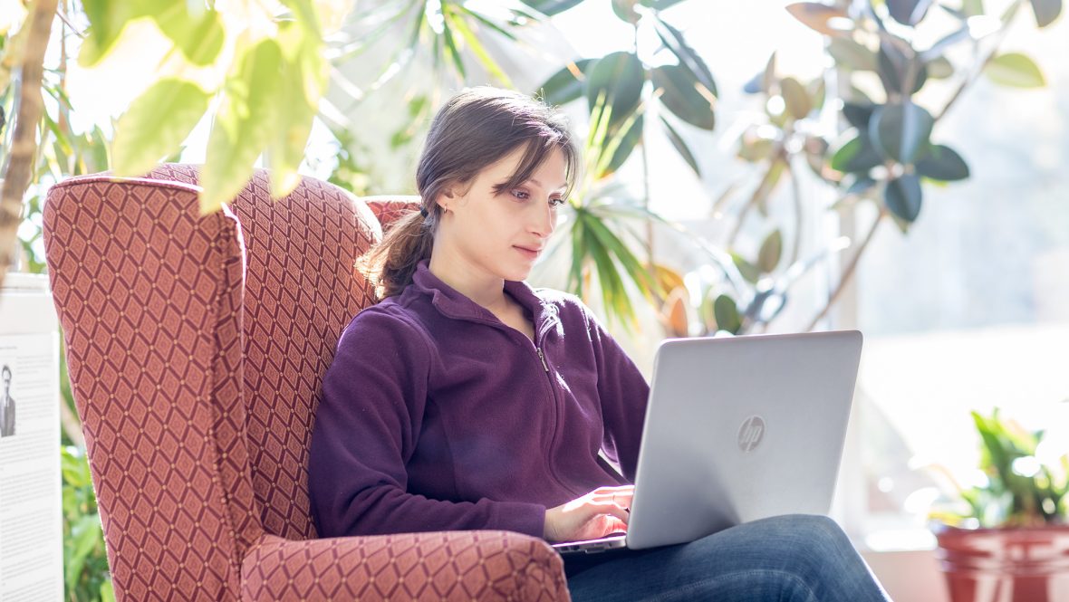 UMA student on laptop