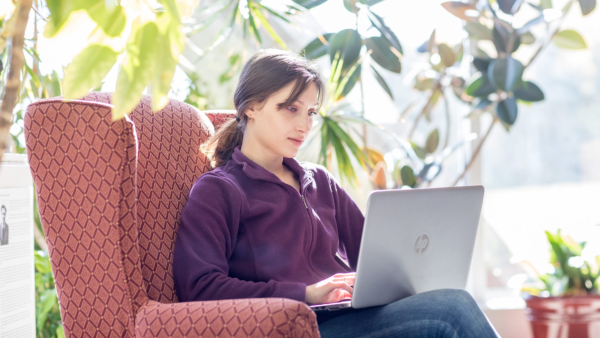 UMA student on laptop
