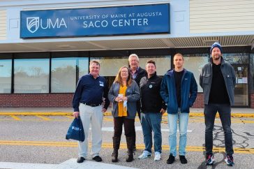 Group photo outisde of UMA Saco Center entrance