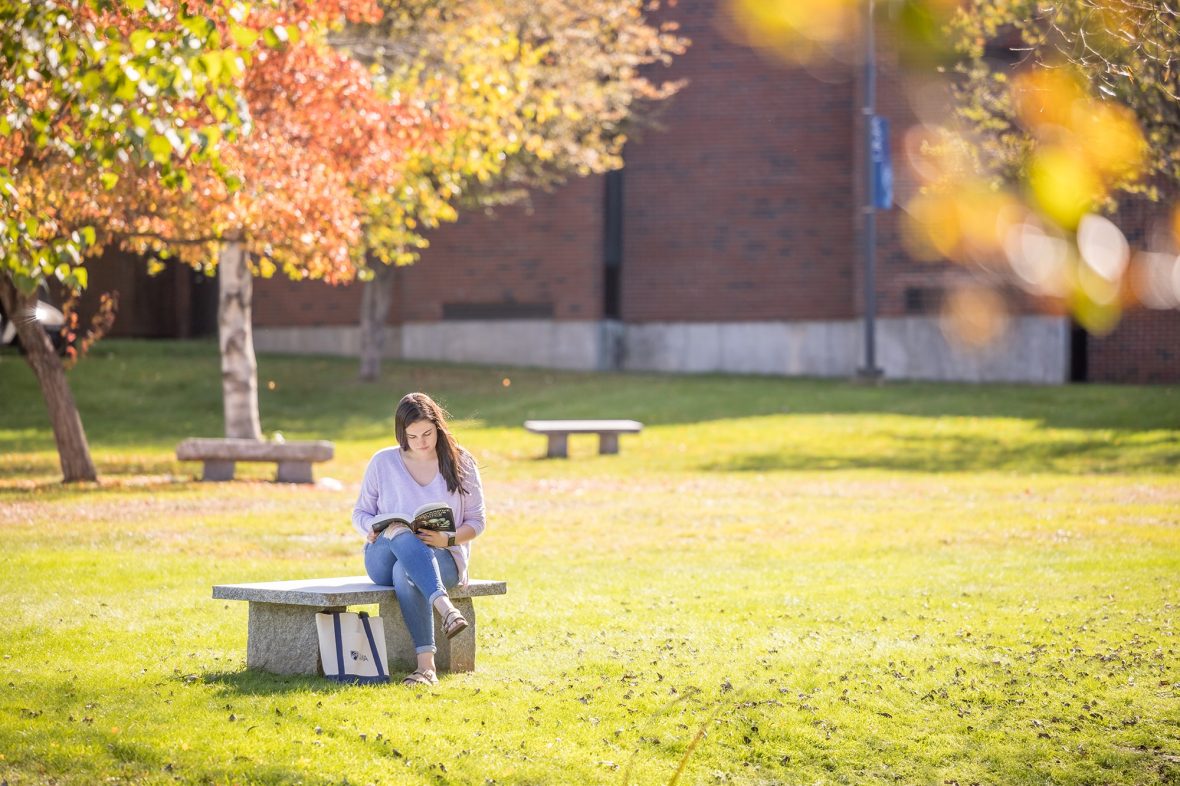 UMA Student Studying on Campus