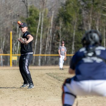 Beth LaFountain pitching during practice