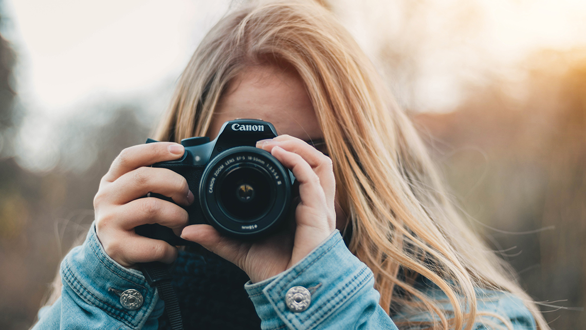 A person using a camera