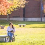 16x9student studying outdoors on augusta campus