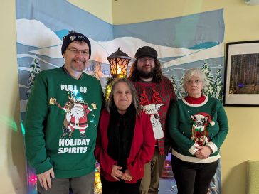 UMA Rumford students, staff, and faculty enjoying "Holidays Celebration" event.