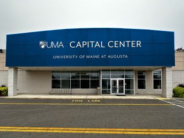 rendering of building entrance sign, not actual photo