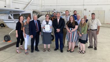 Group photo in hangar 6