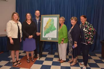 group photo award acceptance