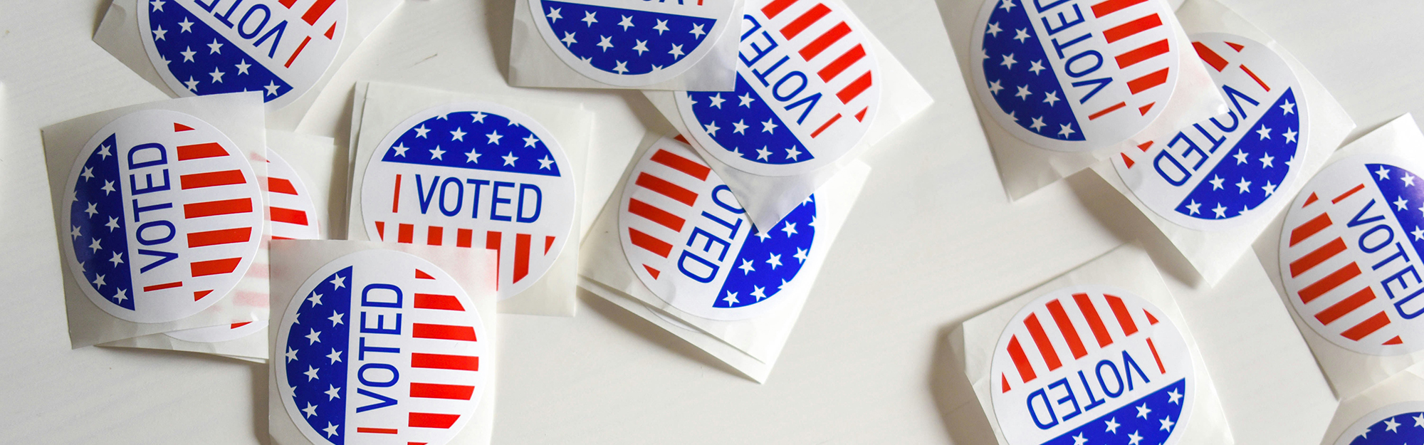 "I Voted" stickers scattered on a table