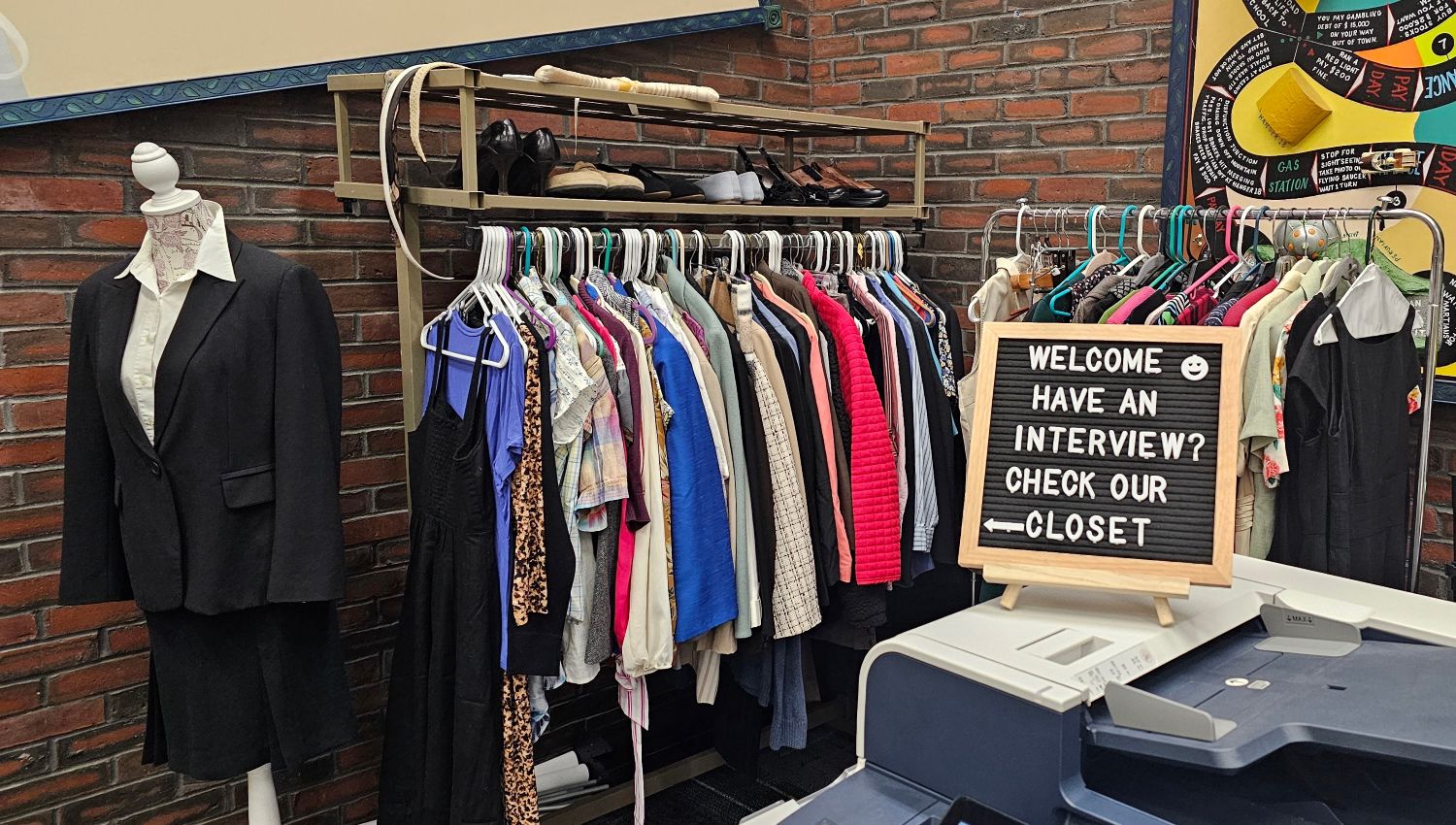 Racks of free business clothing and shoes