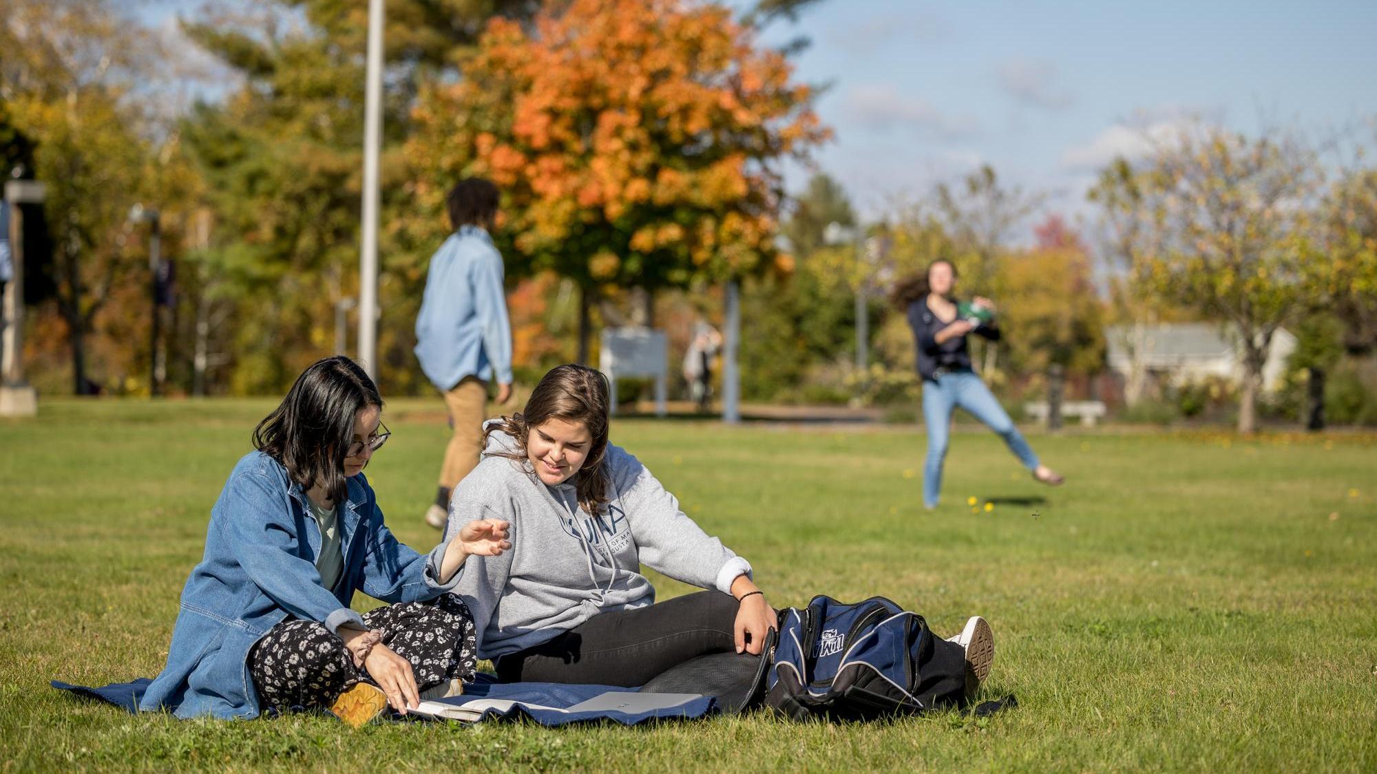 UMA students enjoying the fresh air on the augusta campus quad