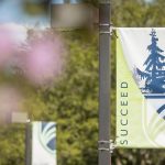 UMA campus banner that says "Inspire"