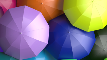 Overhead view of different colored Umbrellas