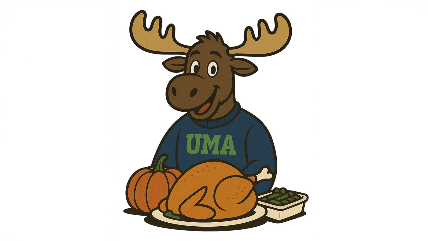 A cartoon moose with a UMA sweatshirt poses with a roasted turkey and THanksgiving sides