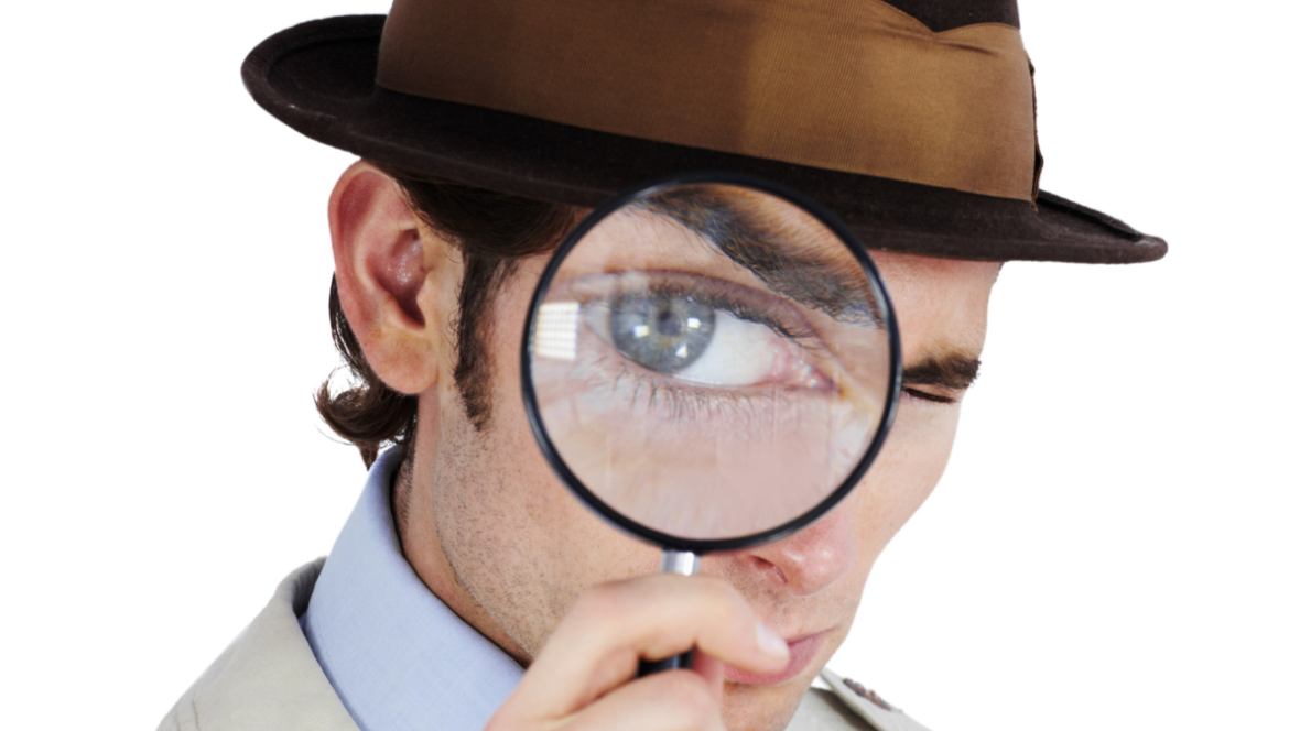 Man using a magnifying glass