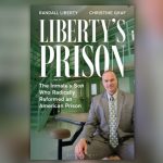 Book cover for Liberty’s Prison by Randall Liberty and Christine Graf. The cover shows a man in a suit seated inside a green-painted prison cell block with metal stairs and railings behind him. Large white title text reads “Liberty’s Prison,” with the subtitle “The Inmate’s Son Who Radically Reformed an American Prison.”
