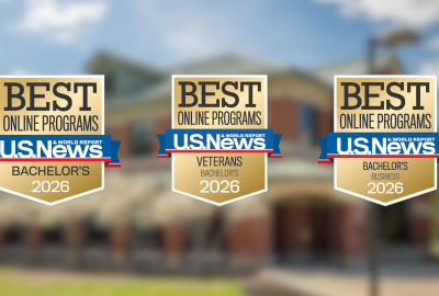 Three U.S. News & World Report ‘Best Online Programs’ badges for 2026: Best Online Bachelor’s, Best Online Bachelor’s for Veterans, and Best Online Bachelor’s in Business, displayed over a blurred campus building background.
