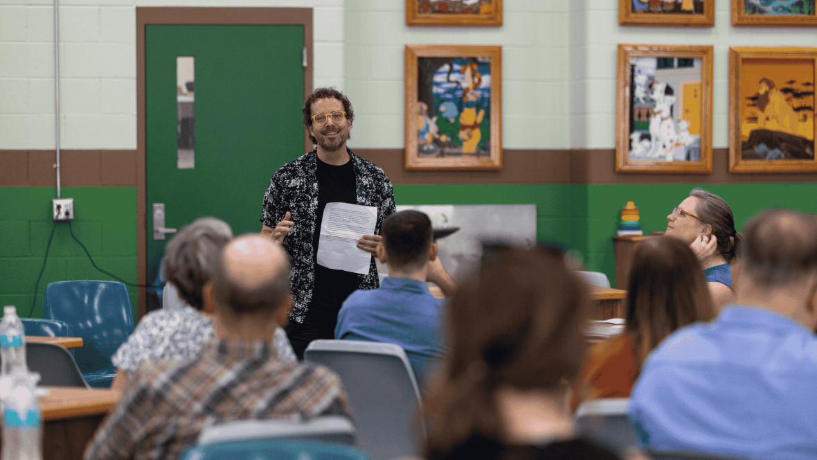 Dan McGloin addressing the crowd at the 2025 PEP Symposium