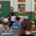 Dan McGloin addressing the crowd at the 2025 PEP Symposium