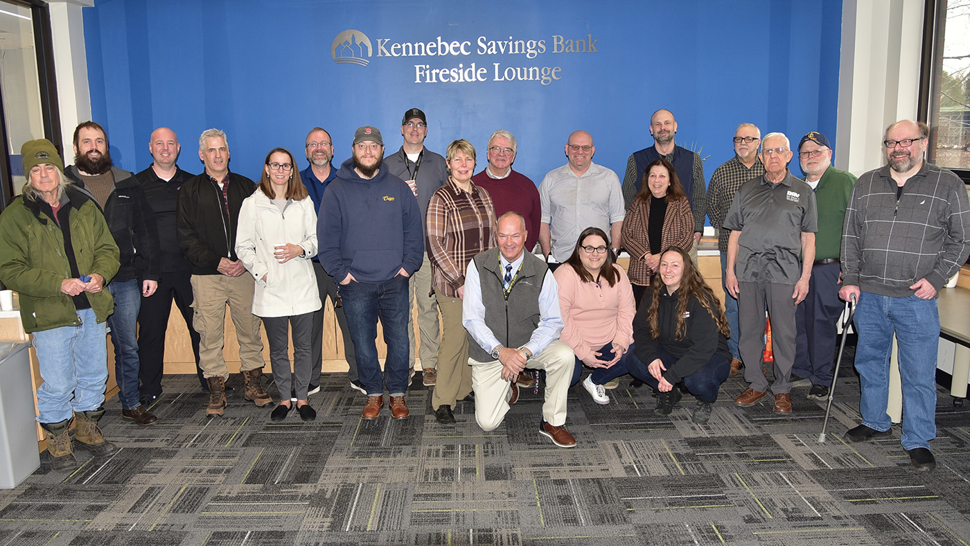 Group Photo os UMA Military & Veterans Services staff and UMA veterans and military students in the Fireside lounge.