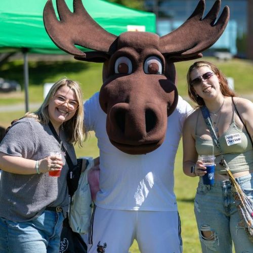 Participants and volunteers at past Accepted Student Day festivities