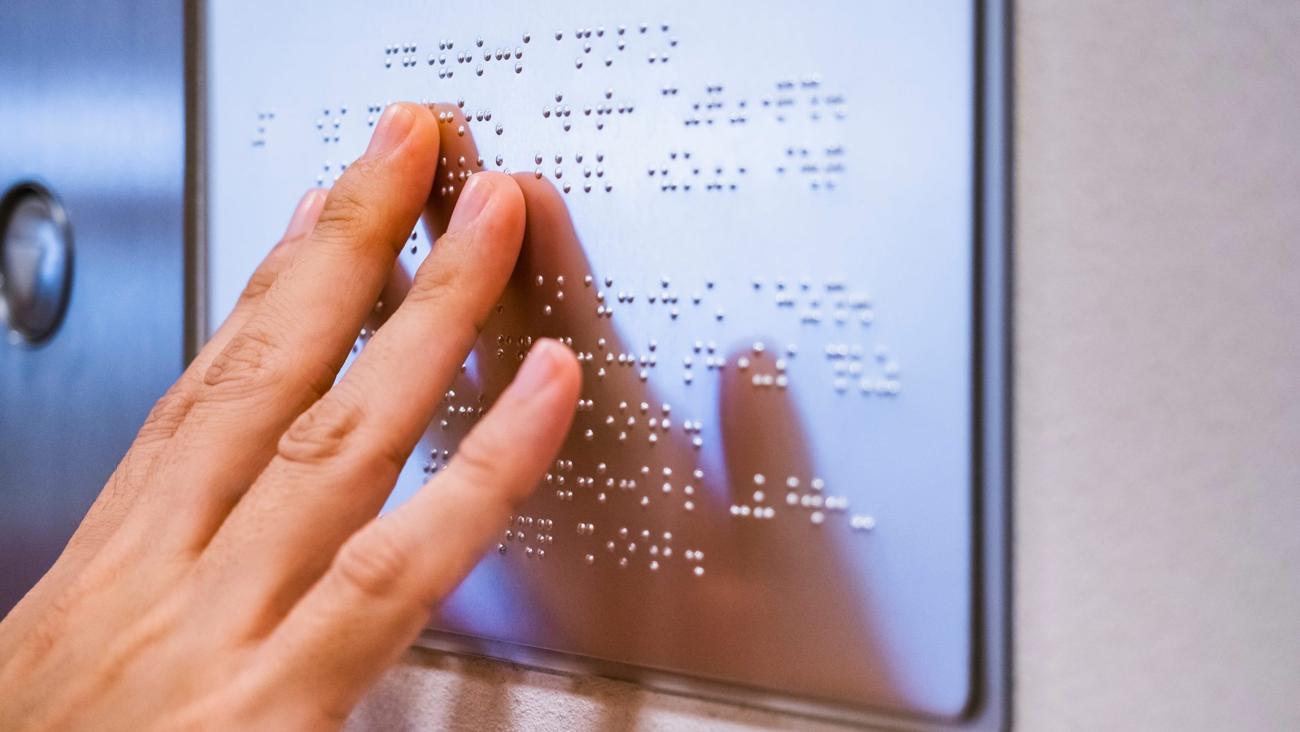 braille signage alphabet reading blind communication on public b