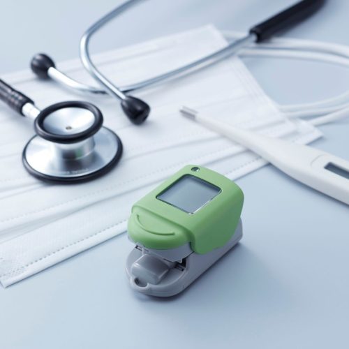 face masks, thermometer, stethoscope, and an oxygen sensor