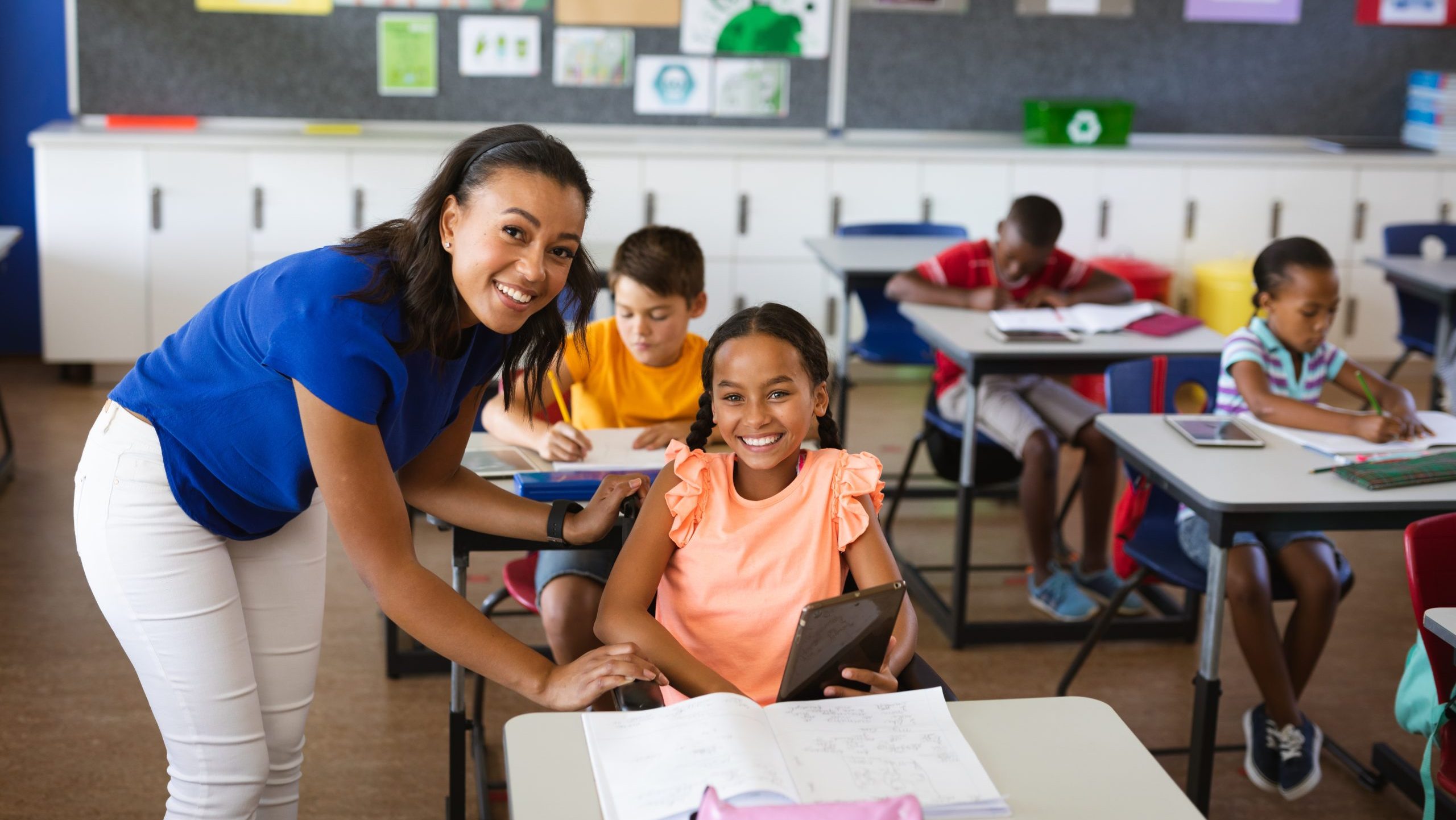 portrait of african american female teacher and disabled girl sm