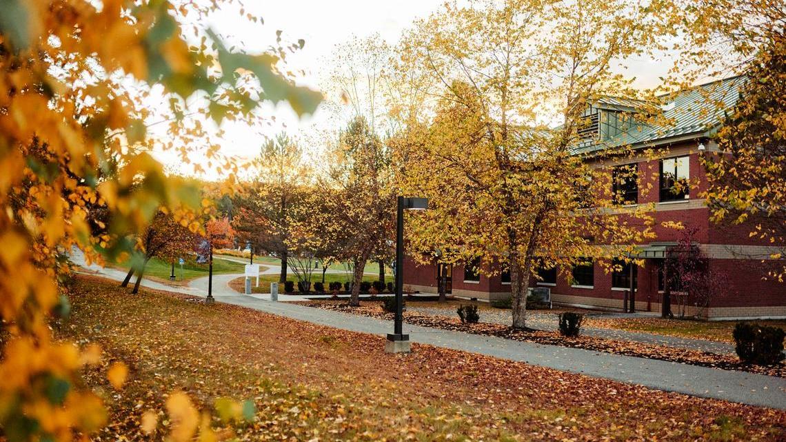 Fall foliage on the UMA Augusta campus walkway near Randall Student Center