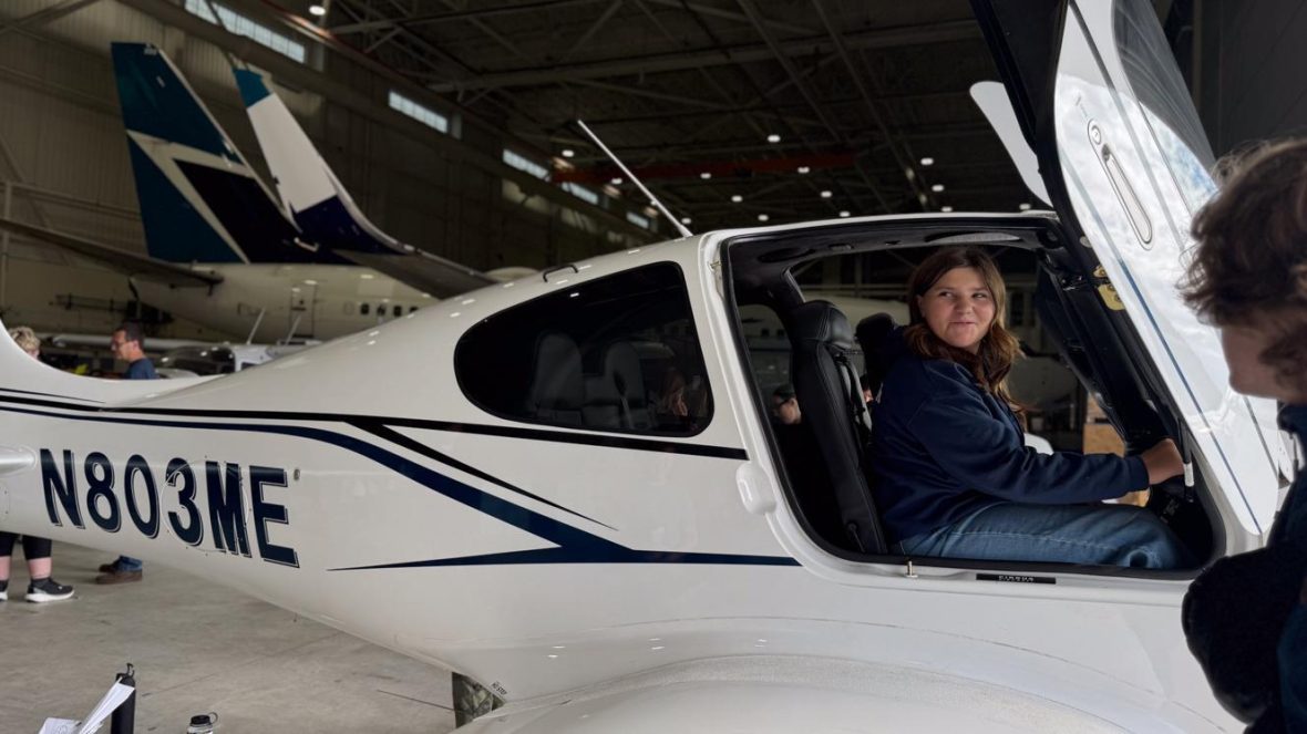 Teen sitting in UMA plane