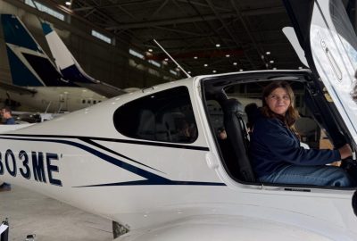 Teen sitting in UMA plane